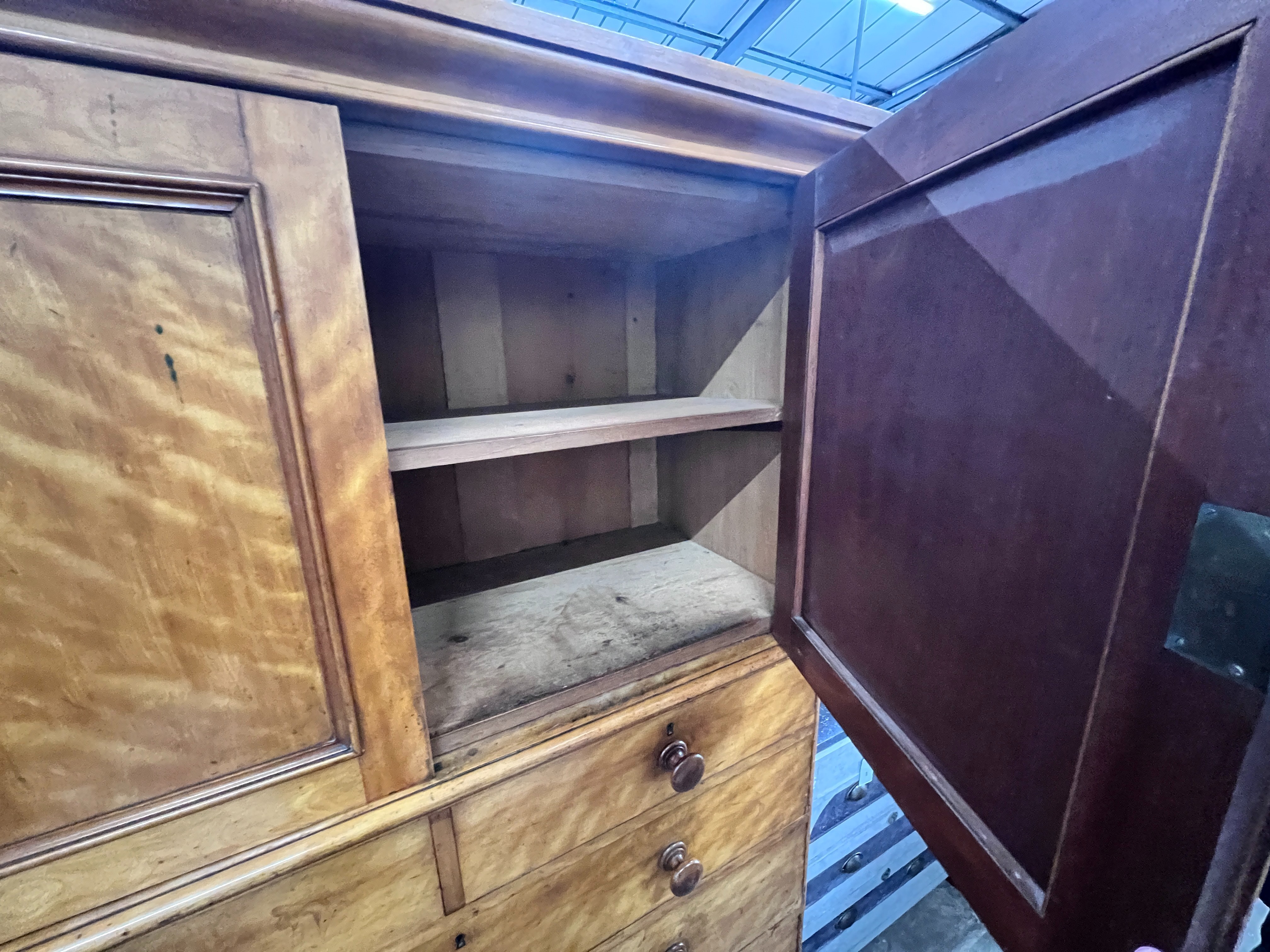 Heal & Son London. A Victorian satin birch press cupboard, width 122cm, depth 53cm, height 188cm